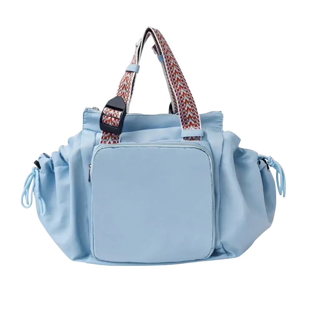 Light blue nylon convertible tote backpack with patterned woven straps and side drawstrings for large capacity use
