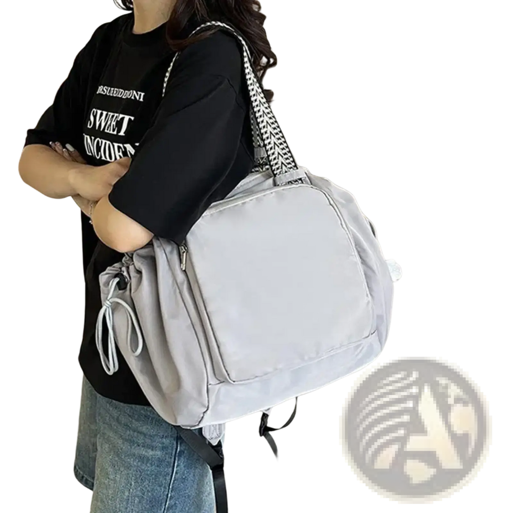 Light gray nylon convertible tote backpack with large capacity and black and white herringbone shoulder strap