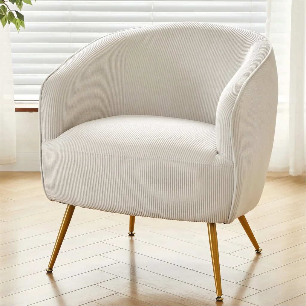 Cream-colored corduroy accent chair with gold-tone metal legs in beige for stylish living room seating