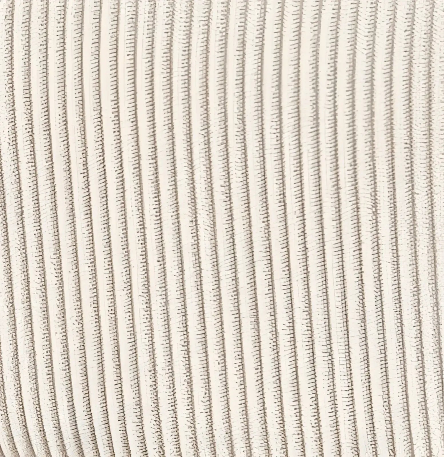 Beige corduroy accent chair with gold legs featuring distinct vertical ribs in the fabric upholstery
