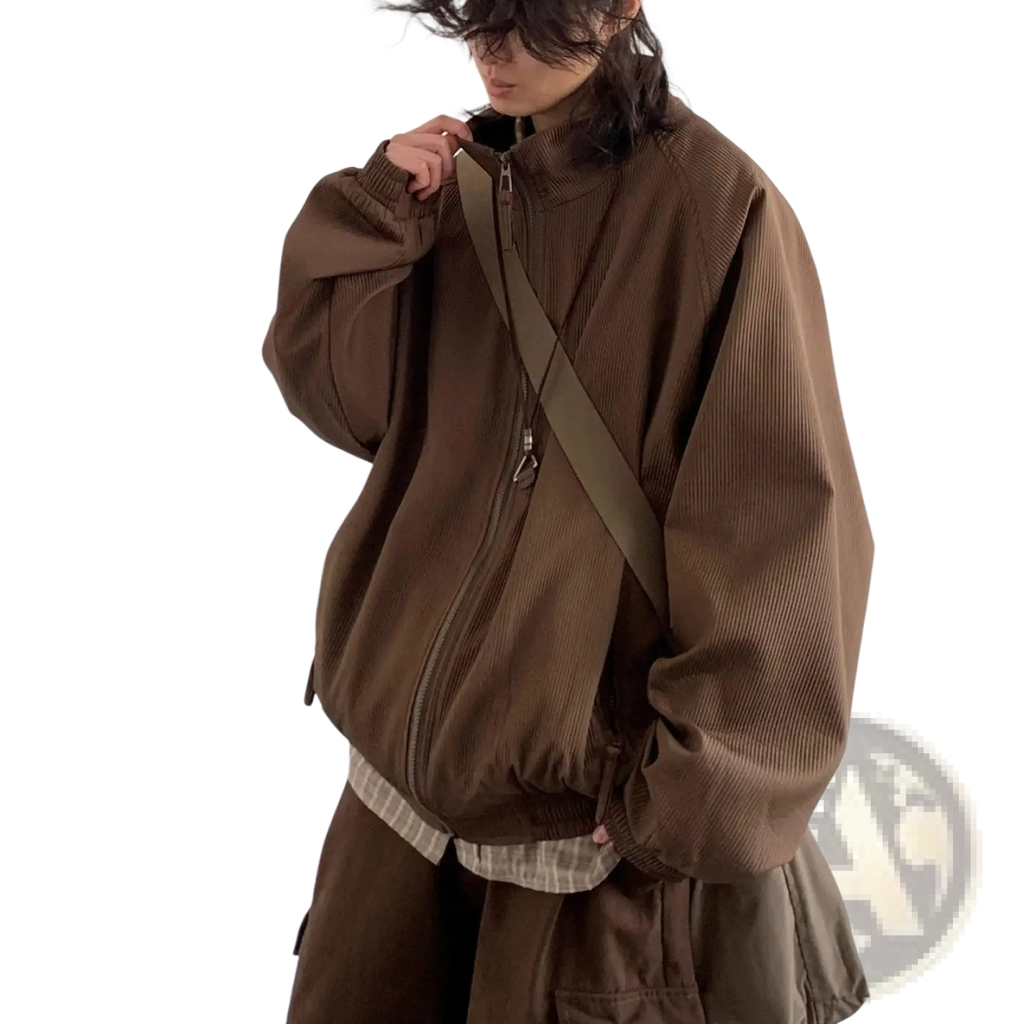 Brown corduroy bomber jacket with full-length zipper and ribbed cuffs in retro loose zipper outerwear style