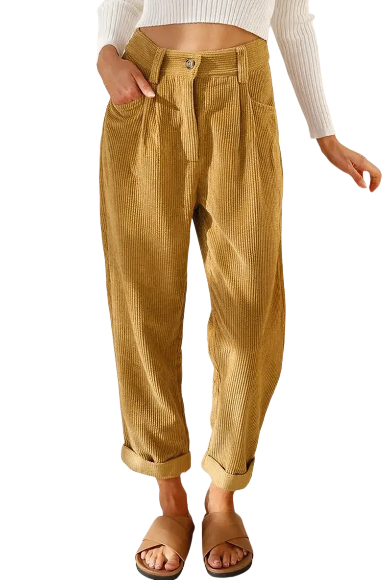 Mustard yellow corduroy high waist loose trousers with rolled cuffs showcasing a casual stylish design