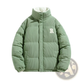 A mint green corduroy puffer jacket with a white embroidered r and cream fleece-lined collar for warmth