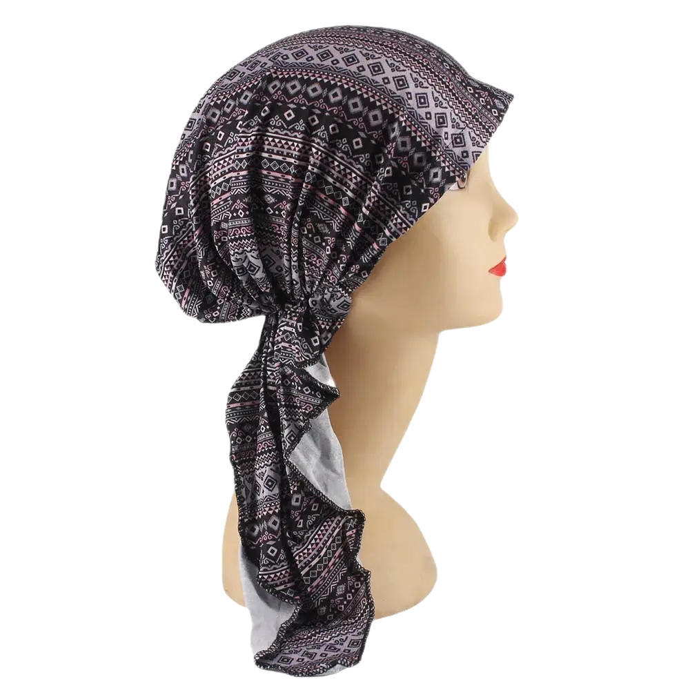 Black and gray patterned corduroy turban hijab hat for women tied at the back showing geometric designs