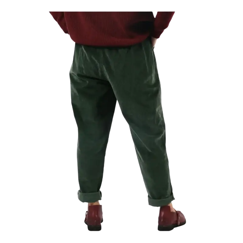 Dark green corduroy wide leg pants with elastic waist and rolled cuffs showing pants length in detailed images