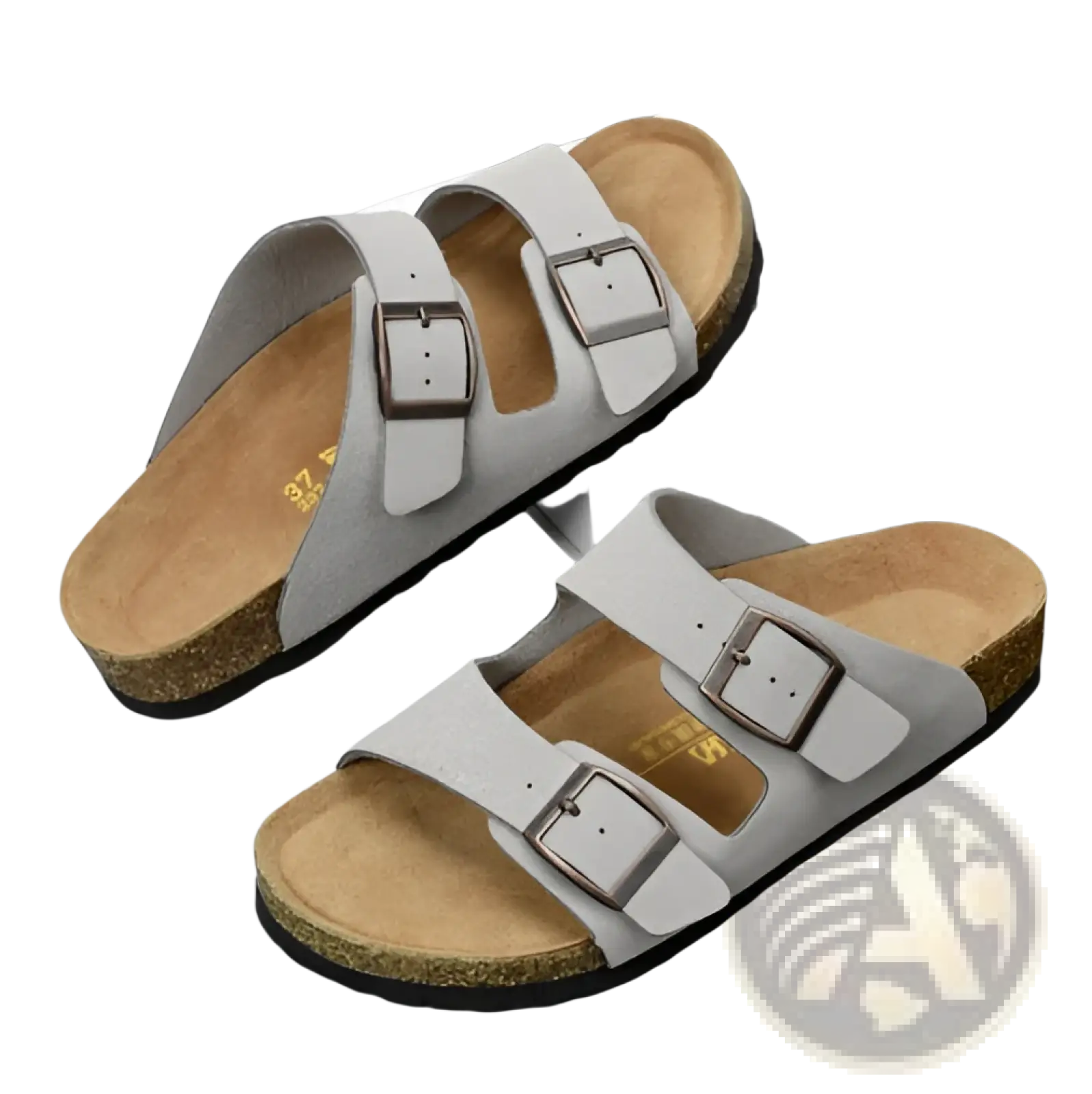 Light gray suede birkenstock cork footbed sandals with two adjustable leather straps and metallic buckles