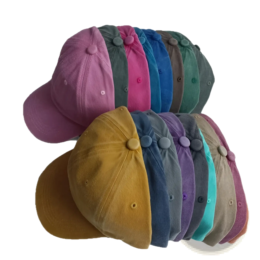 A collection of colorful corduroy cotton baseball caps in purple pink blue green yellow and teal vintage washed style