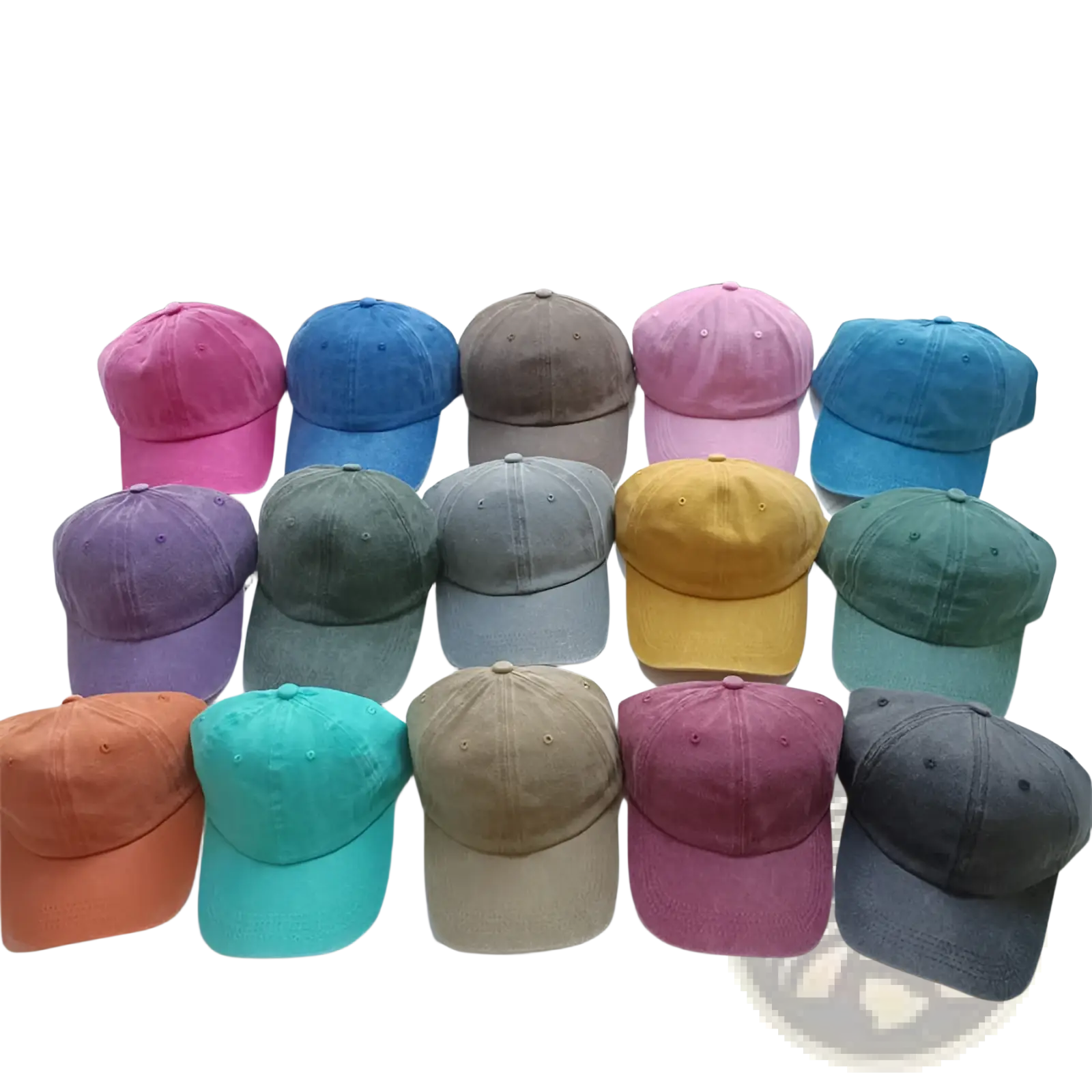 A collection of colorful cotton baseball caps with vintage washed soft texture arranged on a white surface