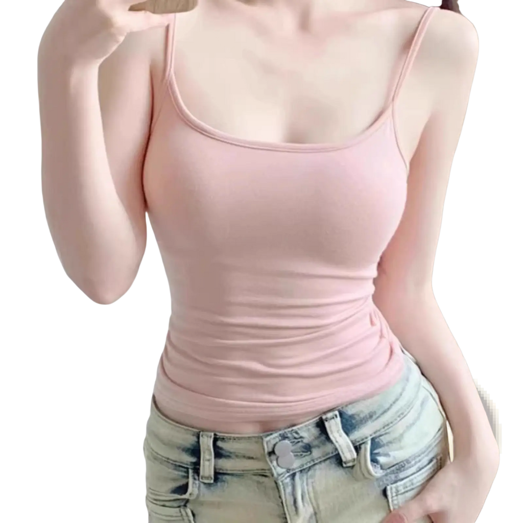 A soft pink cotton camisole crop top with slim fit and spaghetti straps ideal for casual wear