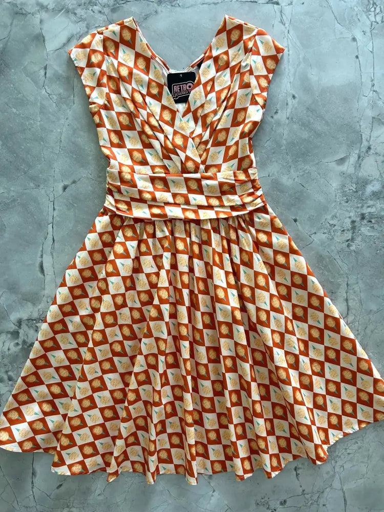 Cotton Candy Greta vintage cotton dress in orange and cream check with citrus print, flutter sleeves, and fitted waistband