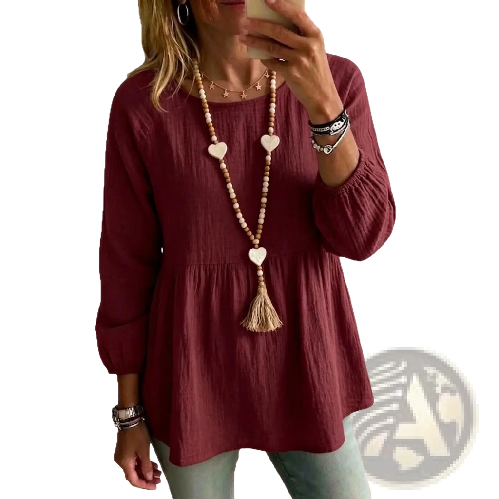 Maroon cotton doll shirt with textured fabric three-quarter sleeves and peplum hem casual loose fit top