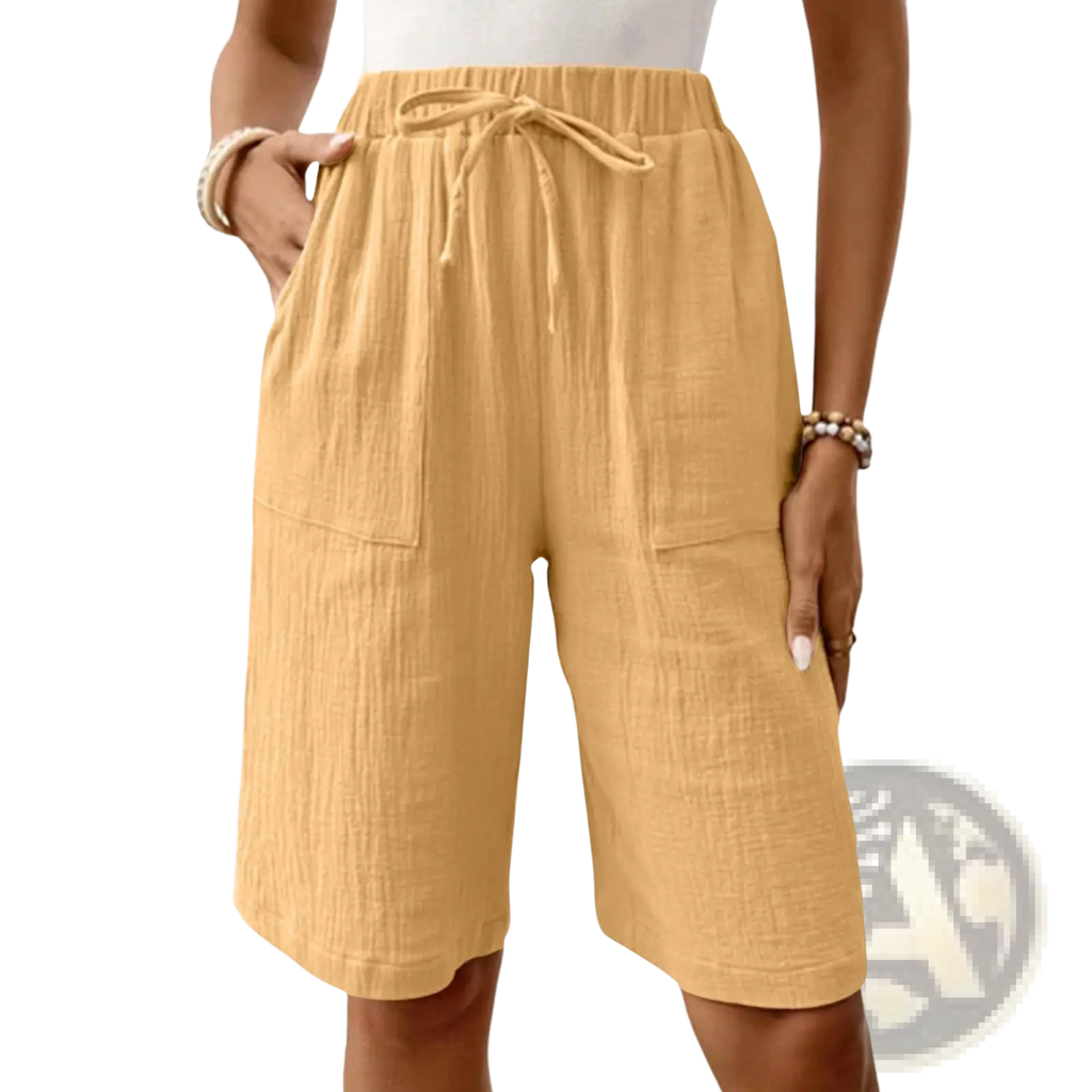 Mustard-yellow cotton drawstring casual capri pants with loose fit and two front pockets for comfortable wear