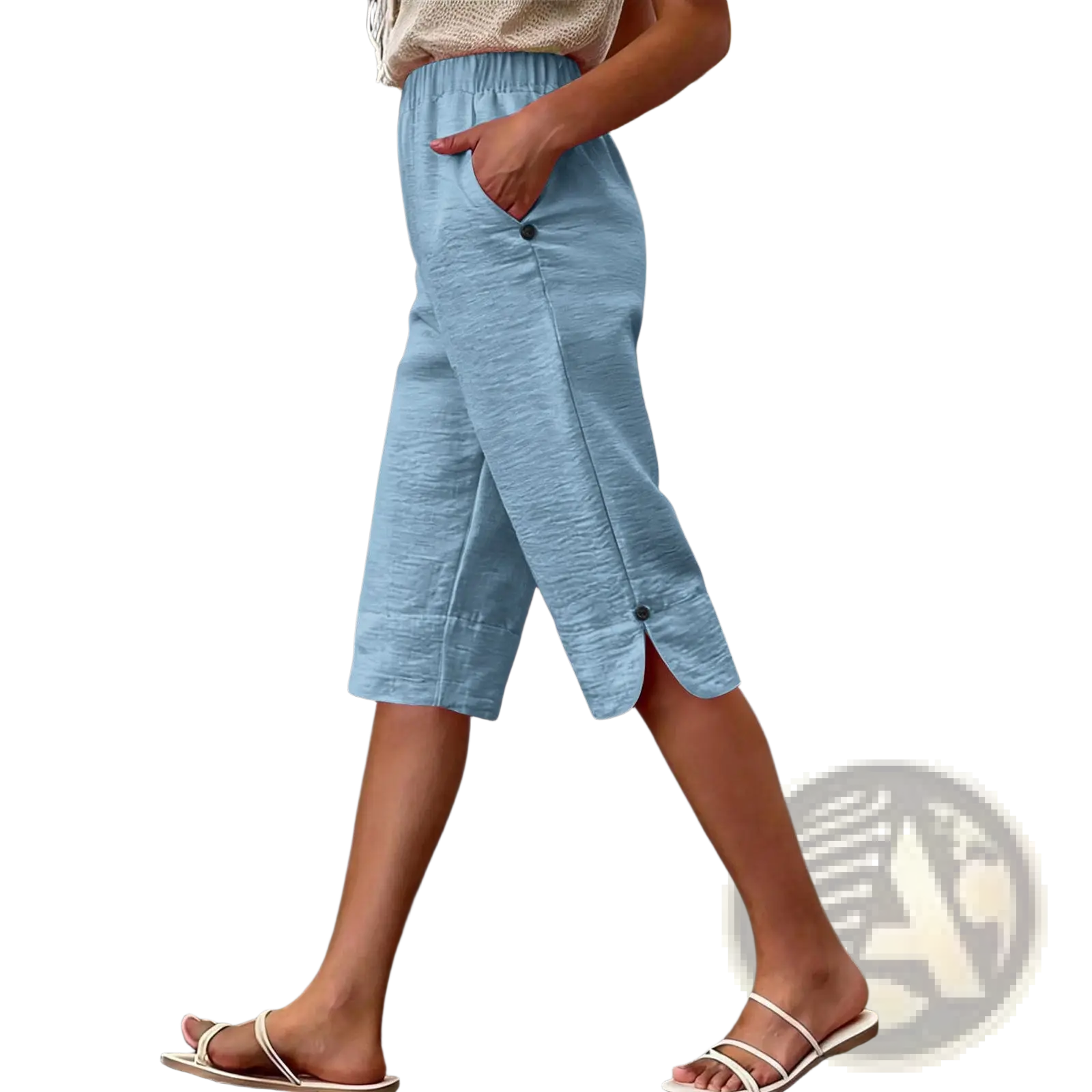 Light blue cotton linen high waist capri pants with textured fabric button details and side slit