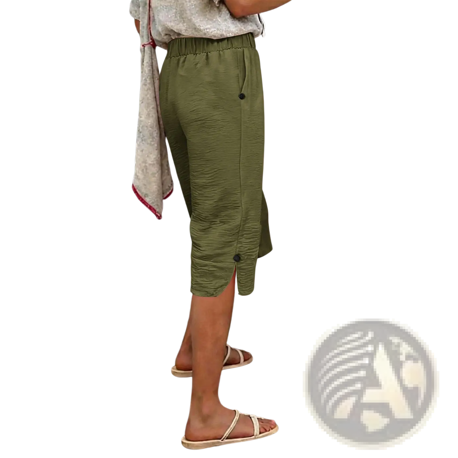 Olive green cotton linen capri pants with high waist and black button details in textured fabric