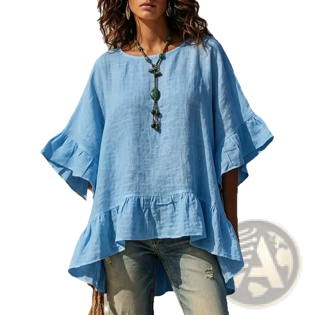 Light blue cotton linen ruffle hem shirt with loose fit and ruffled sleeves and hem for casual wear