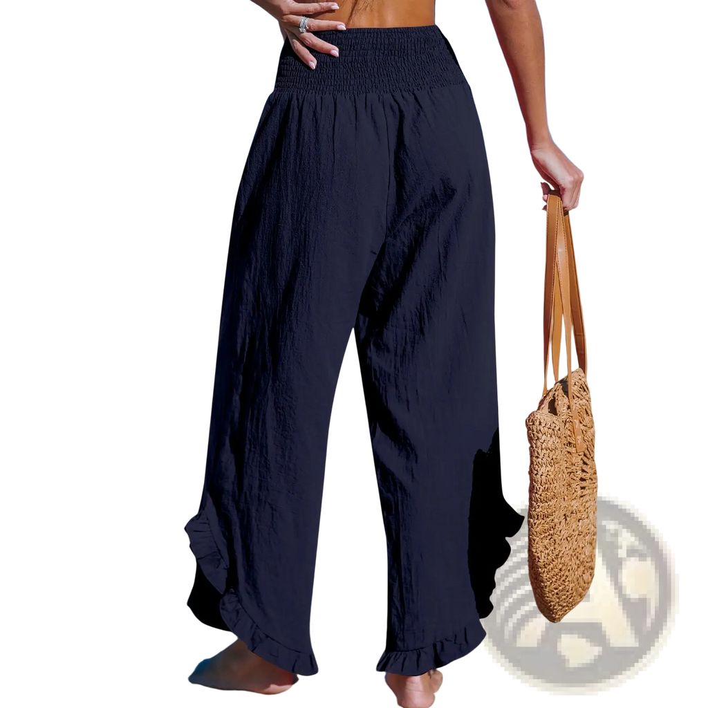 Navy blue cotton linen ruffled harem pants with wide legs and an elastic waistband for comfortable wear