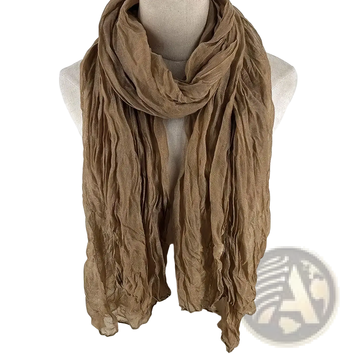 A soft crinkled tan cotton linen scarf for women draped elegantly as a breathable solid color shawl