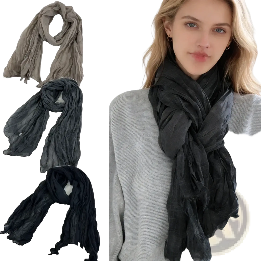 A soft crinkled black cotton linen scarf for women with a lightweight flowing texture worn around the neck