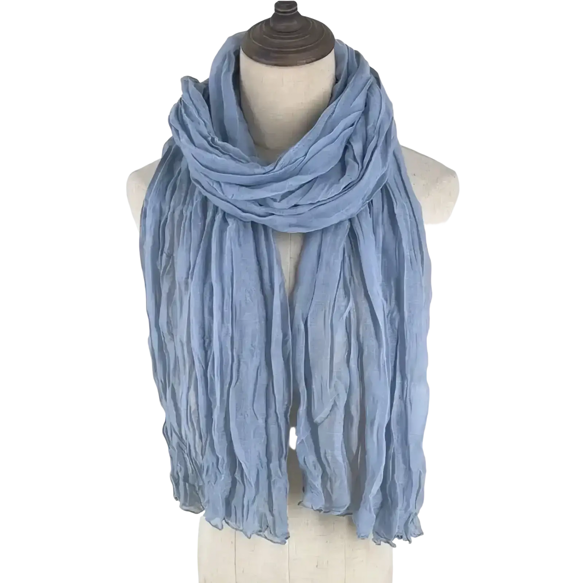 A soft light blue cotton linen scarf draped elegantly on a mannequin for women solid color shawl