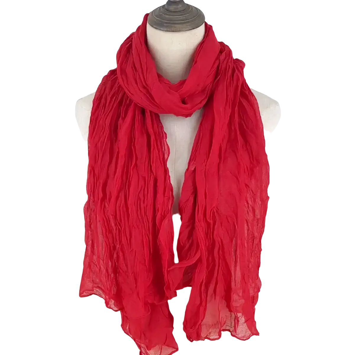 A vibrant red lightweight cotton linen scarf for women draped around a mannequin’s neck