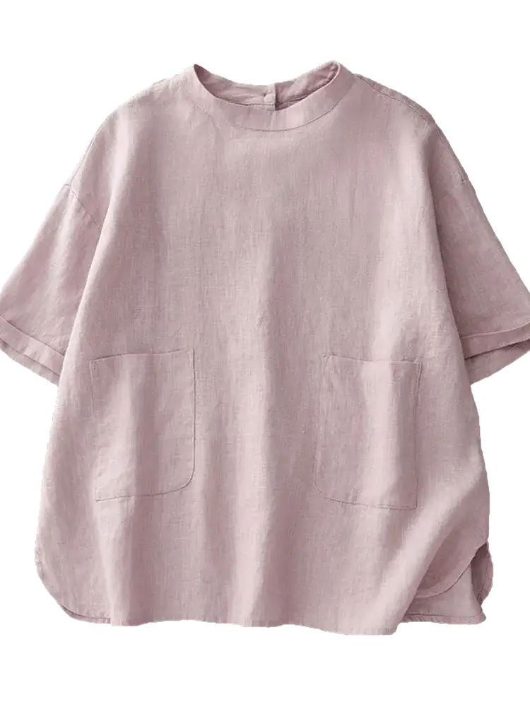 A soft lavender cotton linen short sleeve top with relaxed fit and two front pockets made from linen material