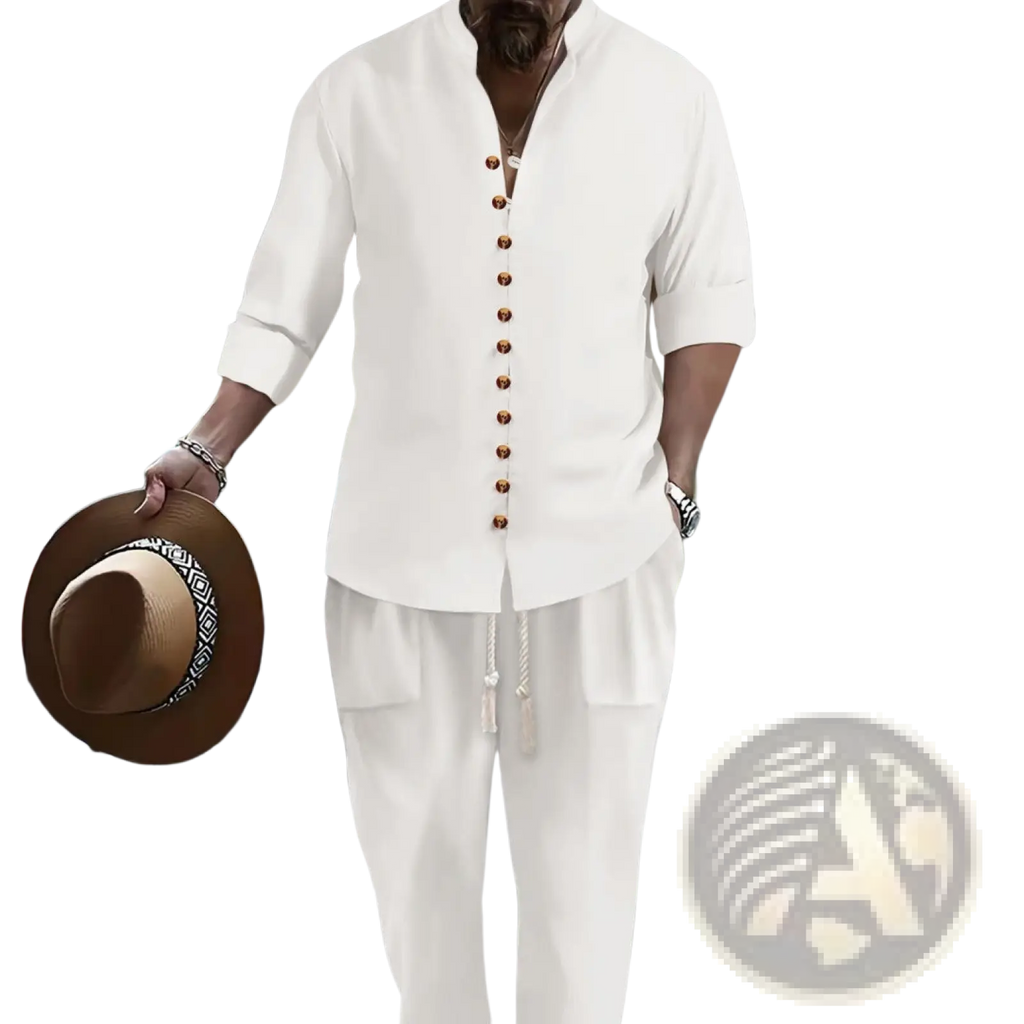 A man wearing a cream cotton linen two piece casual outfit with button front short sleeve shirt and matching trousers