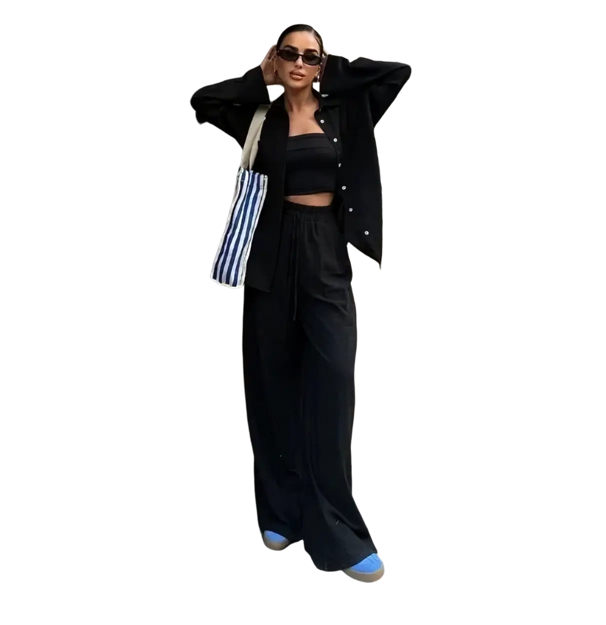 Black cotton linen wide leg trousers with relaxed flowing silhouette and subtle pleats at the waistband from two piece sets