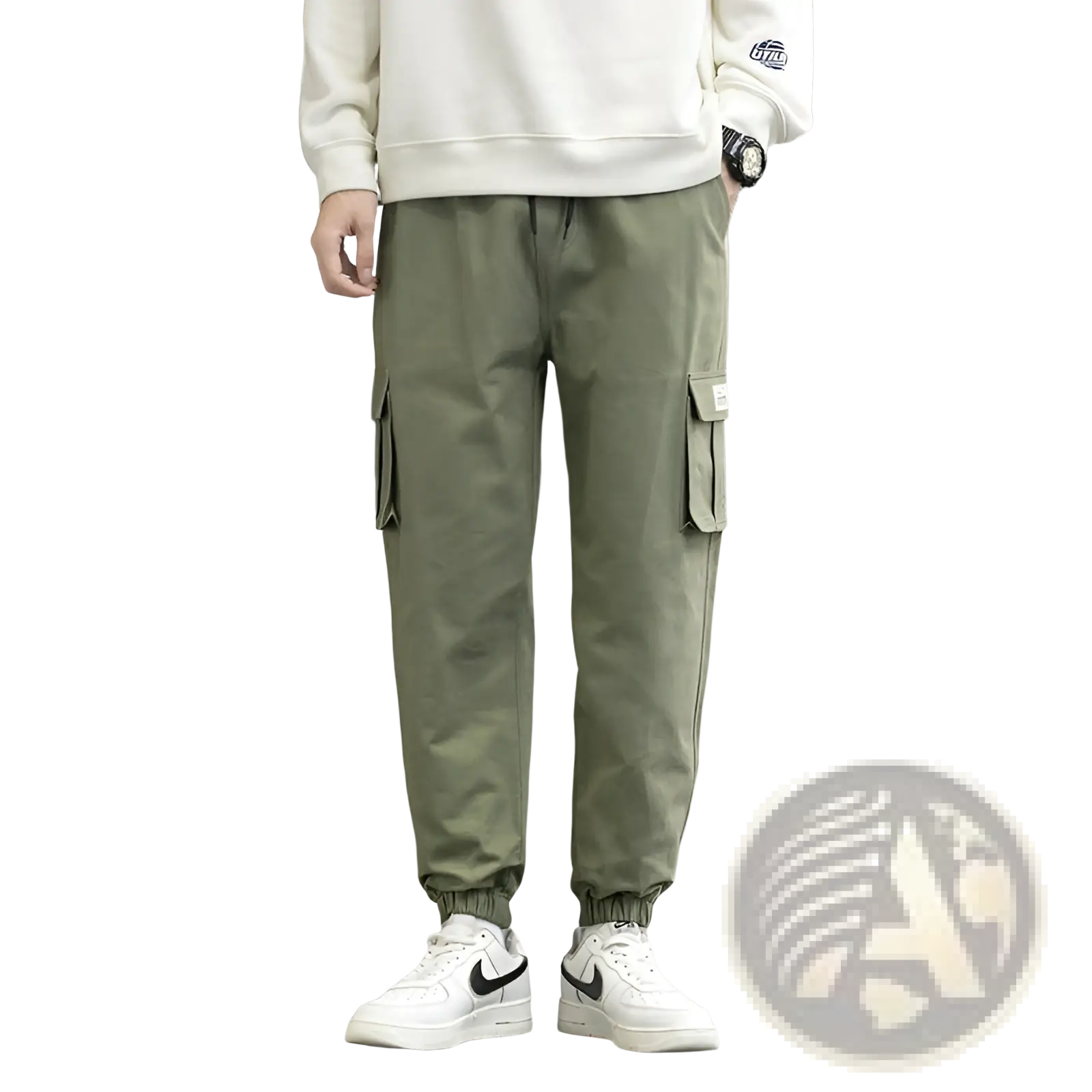 Olive green cotton cargo joggers with multiple side pockets and elastic cuffs designed for techwear style