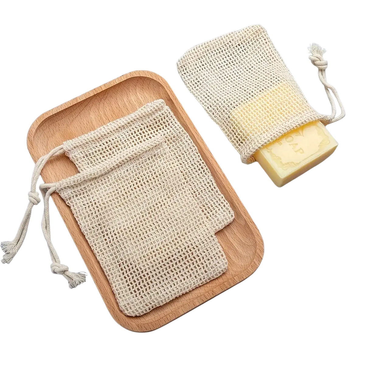Beige mesh cotton soap saver bag with drawstring closure and tassels holding a pale yellow soap bar in 3 pack