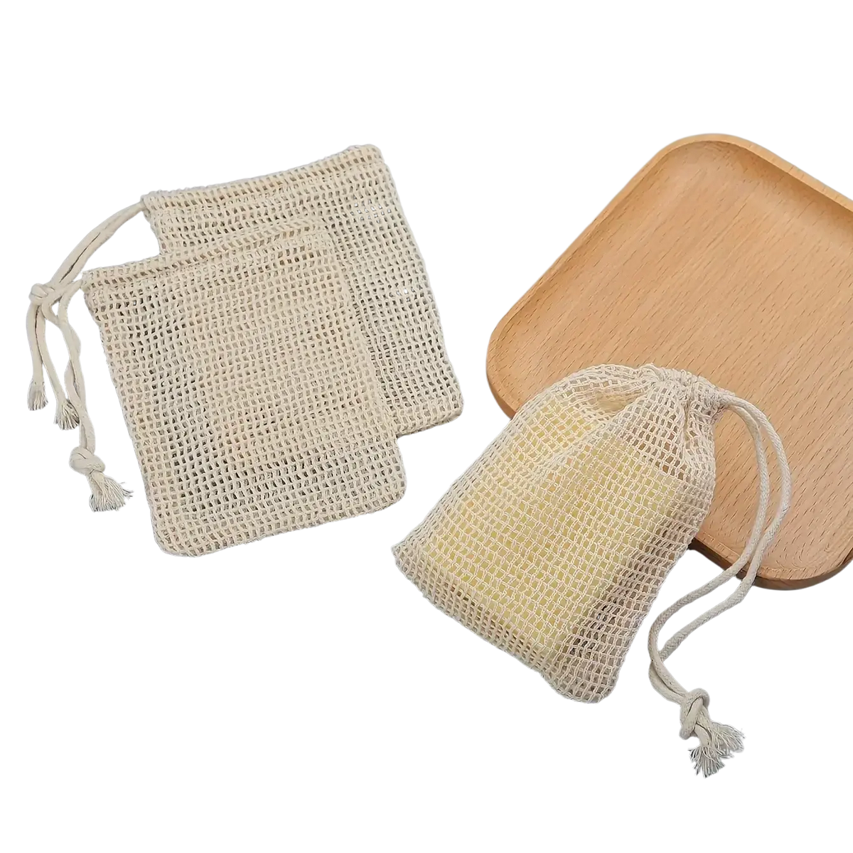 Off-white cotton mesh soap saver bags with drawstring closures and tassels 3 pack for eco-friendly storage