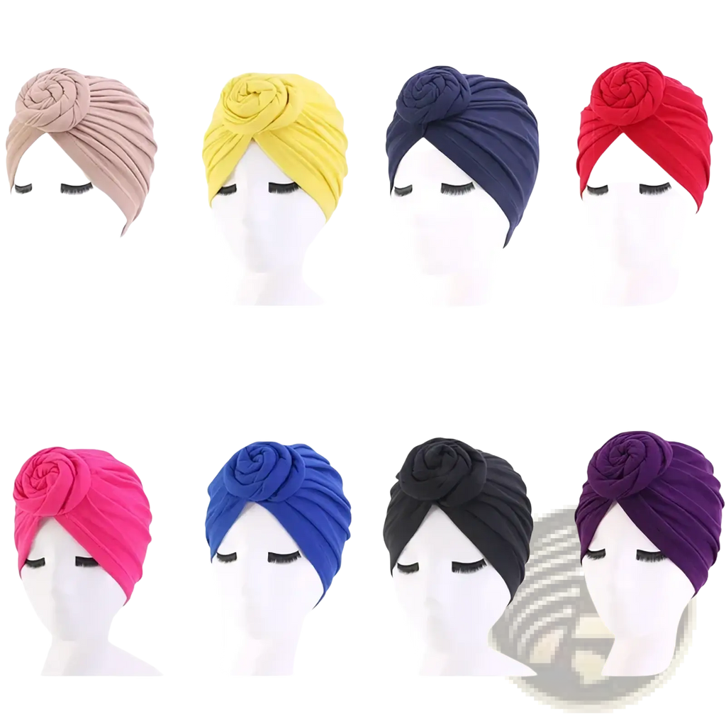 A collection of cotton turban headwraps for women with rose knot detail in pastel pink yellow navy blue red magenta royal blue black and purple