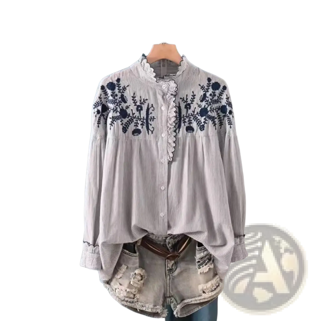 A light gray striped cotton yarn blouse with navy blue floral embroidery on shoulders and lace-trimmed front