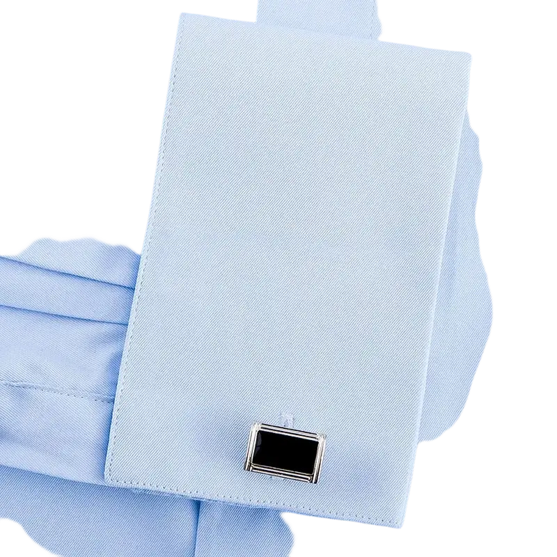 Silver rectangular cufflink with black inlay fastened to light blue covered button french cuff dress shirt for men asian size