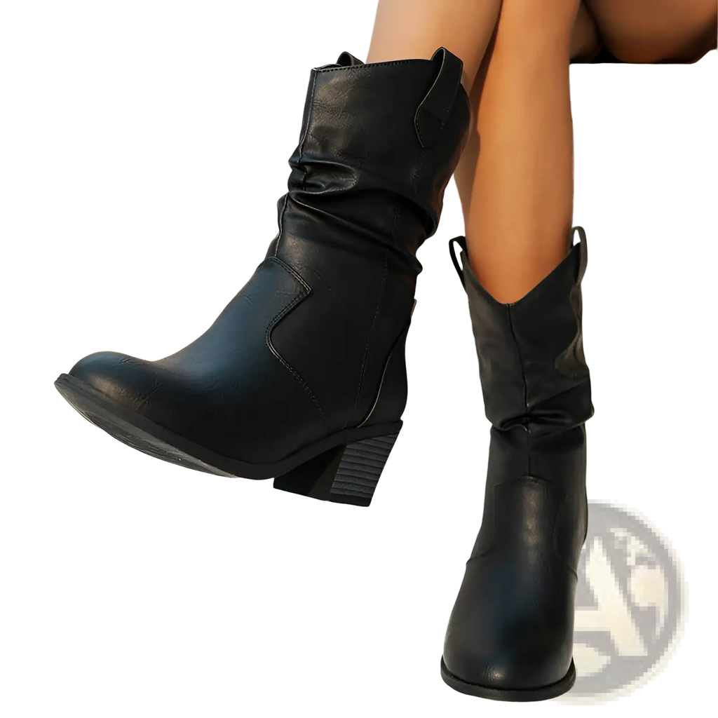 Black leather cowboy boots for women with a square stacked heel and cuffed ankle mid calf design