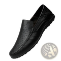 Black leather slip-on cowhide loafer with breathable perforated detailing and braided stitching for comfortable wear