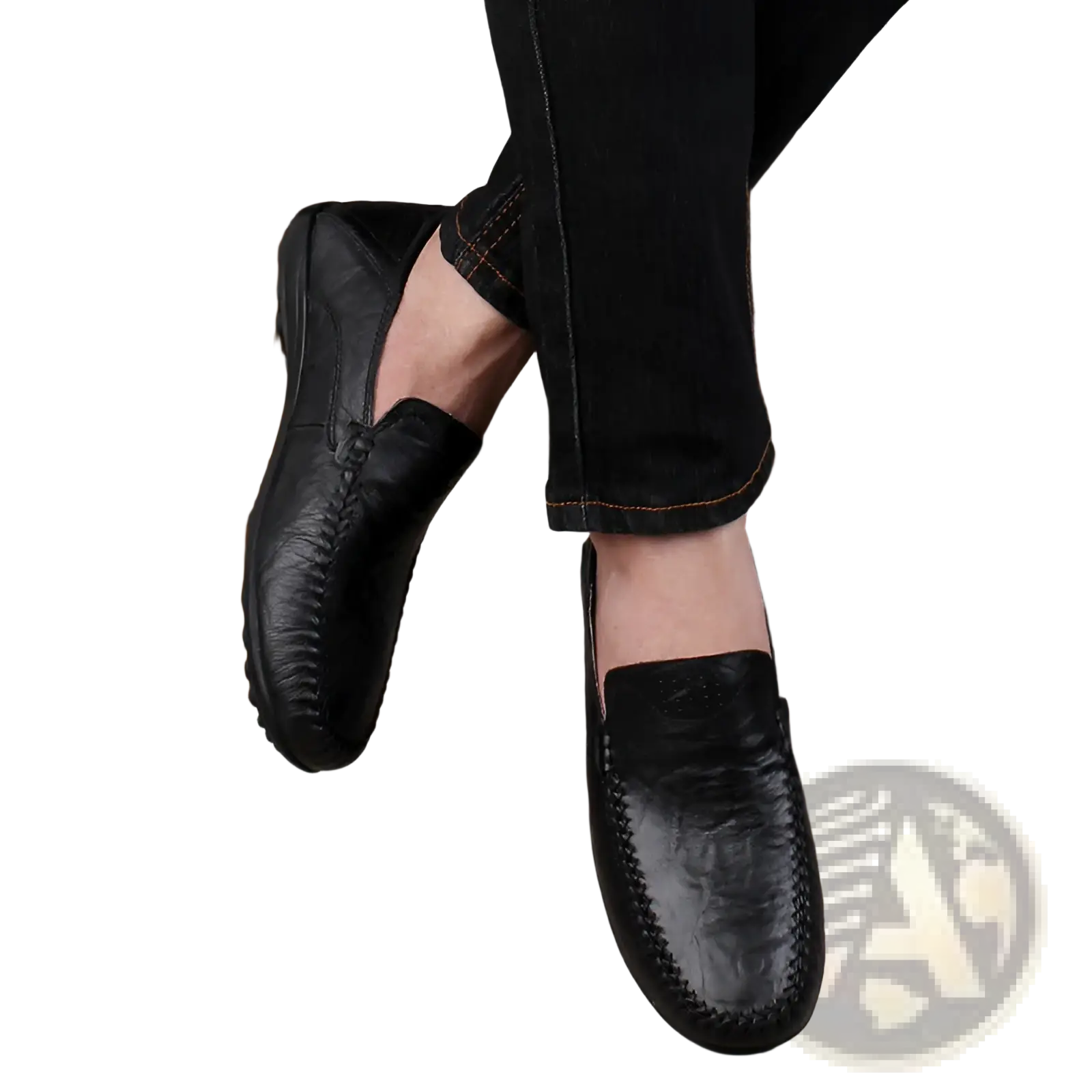 Black cowhide leather breathable perforated gommino shoes with stitched detailing and classic slip-on design