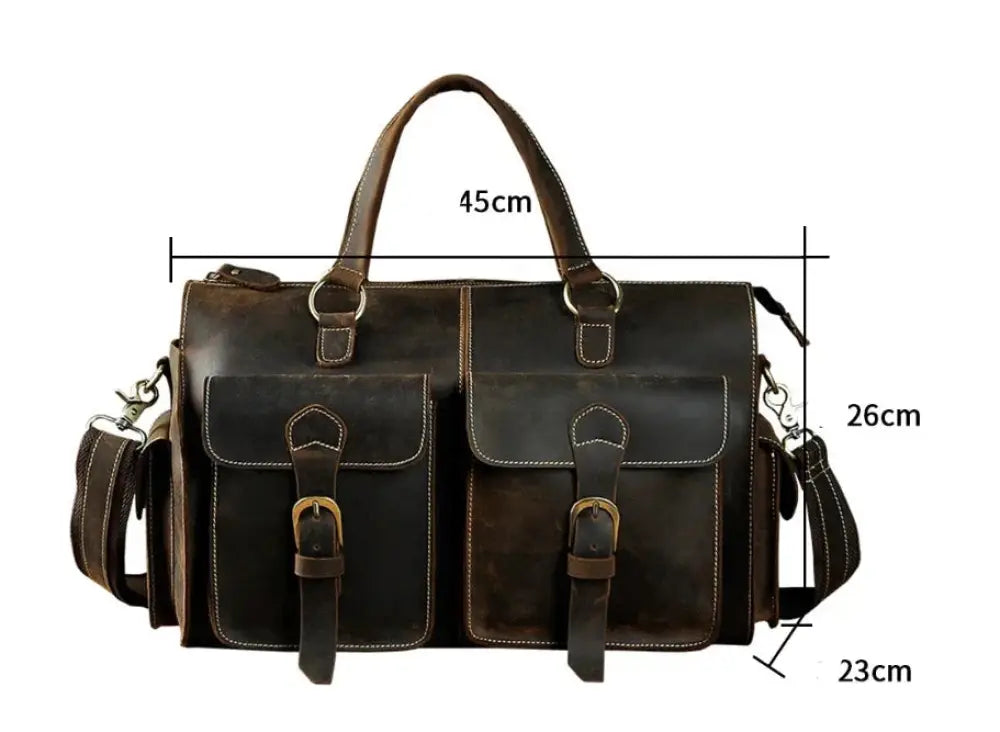 Dark brown vintage crazy horse leather satchel bag with brass hardware and two front flap pockets secured by buckles