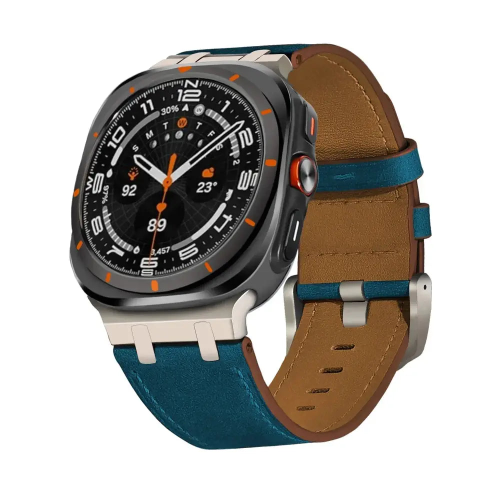 A sleek smartwatch with a black dial and orange bezel paired with a premium crazy horse leather watch strap in teal and tan