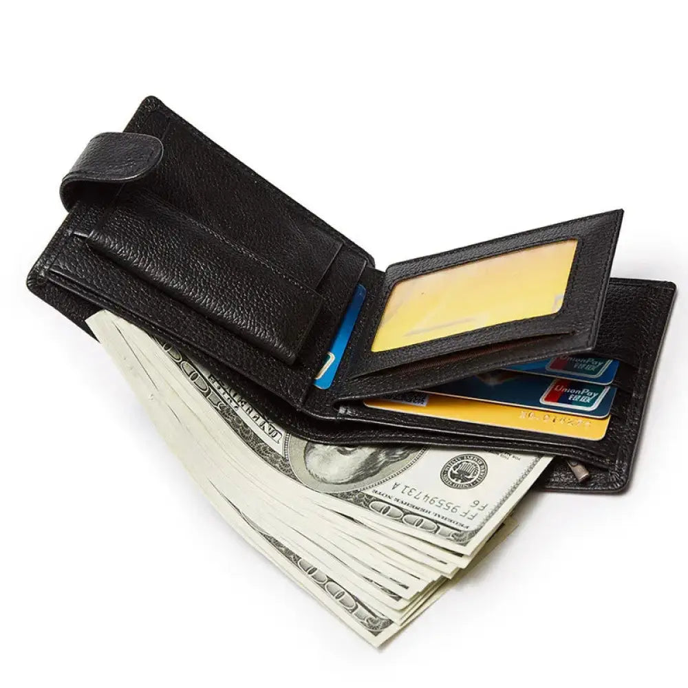Black vintage crazy horse leather wallet with textured surface open showing multiple credit cards and us 100 dollar bills