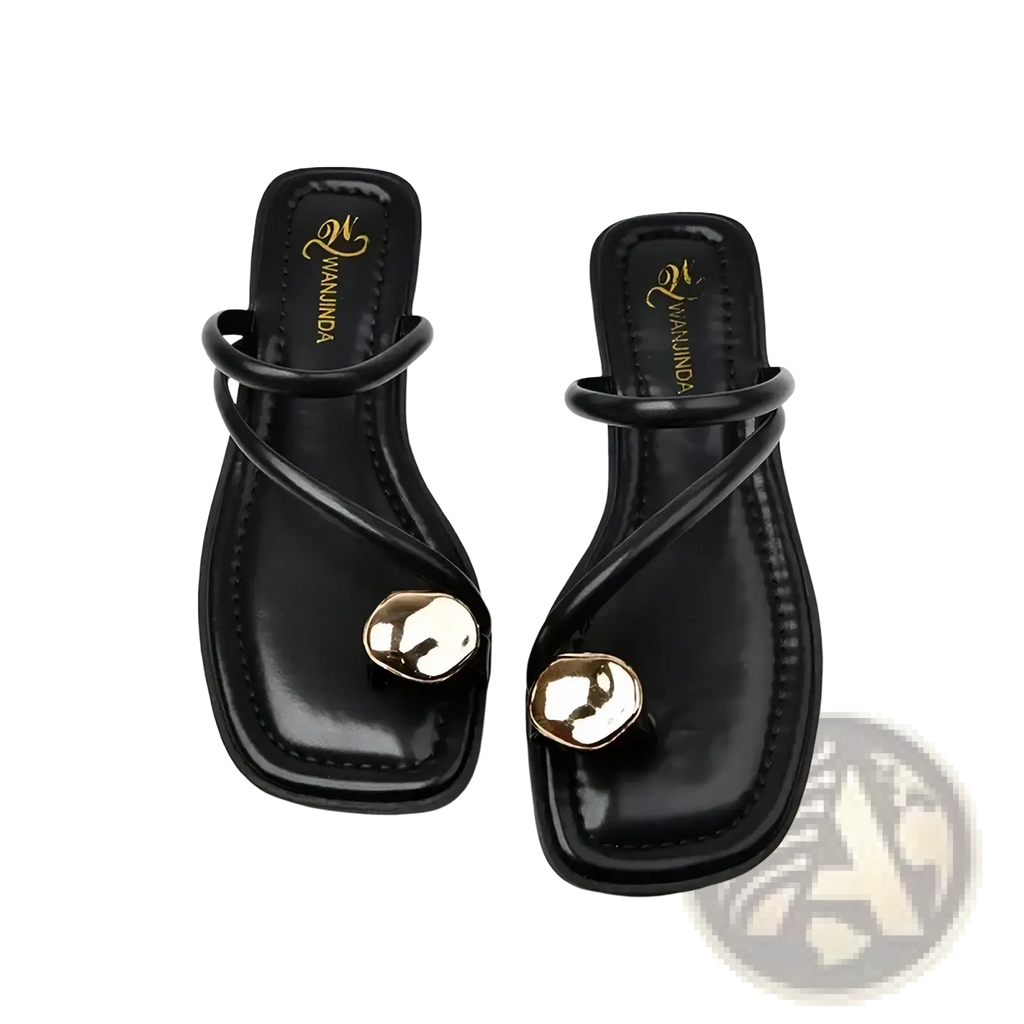 Black wananida flip-flops with glossy finish and gold-tone round embellishments on the toe strap cream flat sandals
