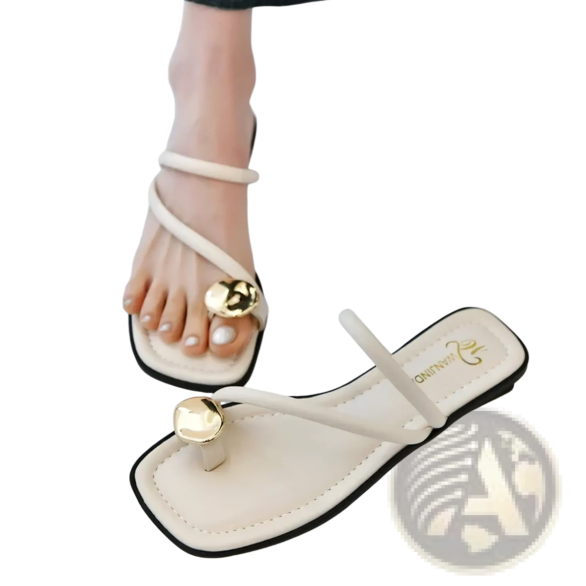 Cream flat sandals with gold-toned circular toe posts cream color and black trim for elegant casual wear