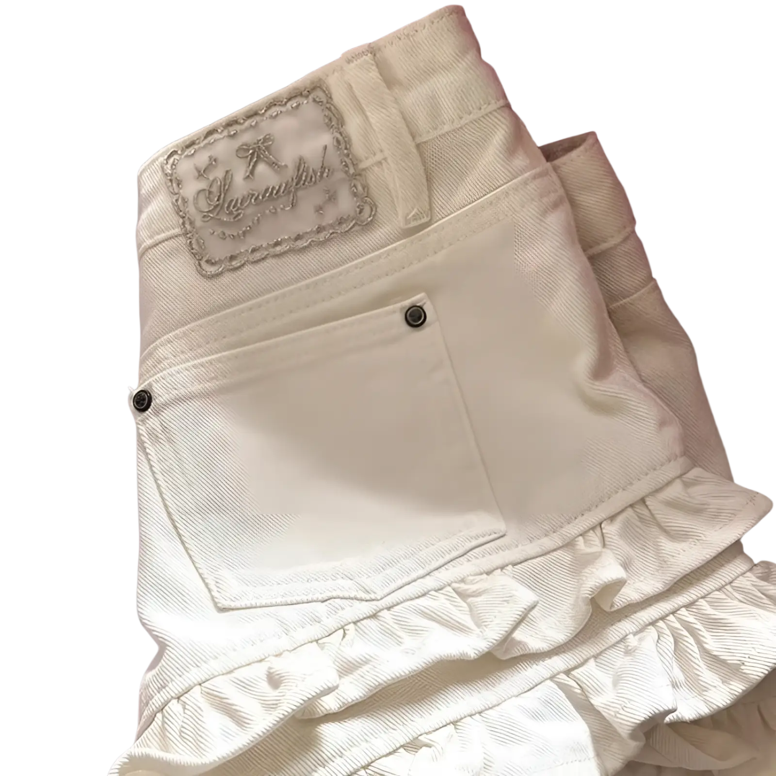 Back view of cream ruffled denim shorts high waist featuring cream-colored fabric and lavanyfish embroidered patch