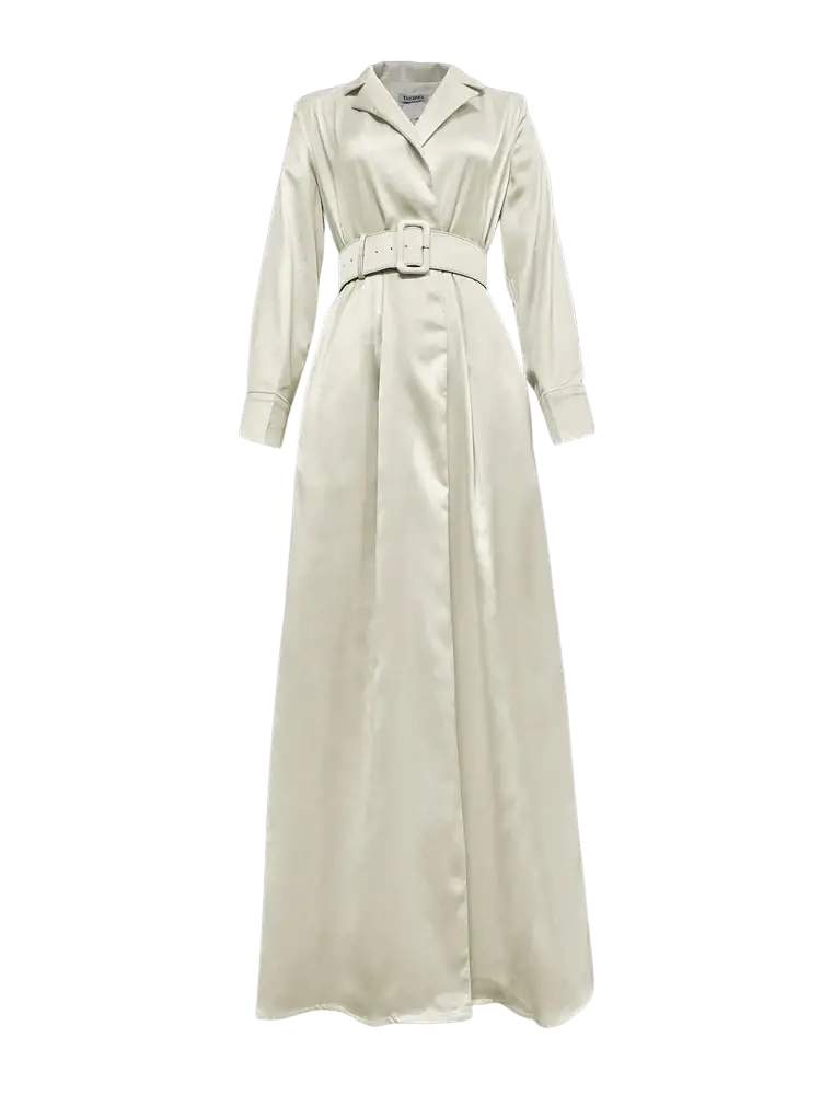 Cream satin trench dress with belted waist long sleeves and maxi length in a cream-colored satin fabric