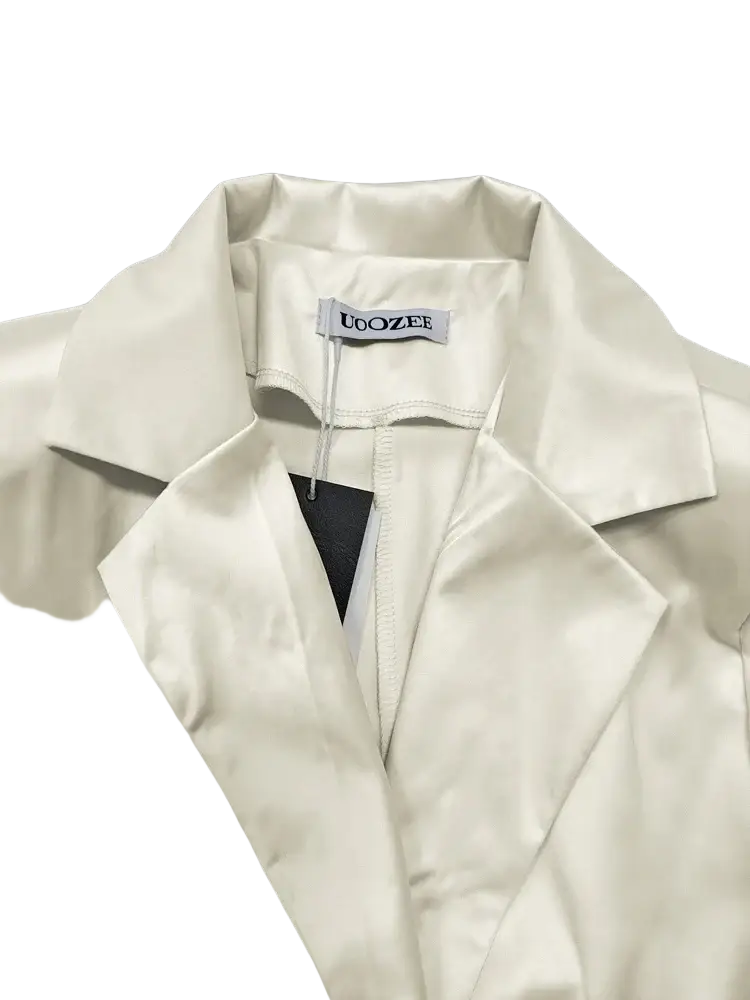 Cream satin trench dress long sleeve maxi featuring a cream satin blazer with a sleek structured collar and clean stitching