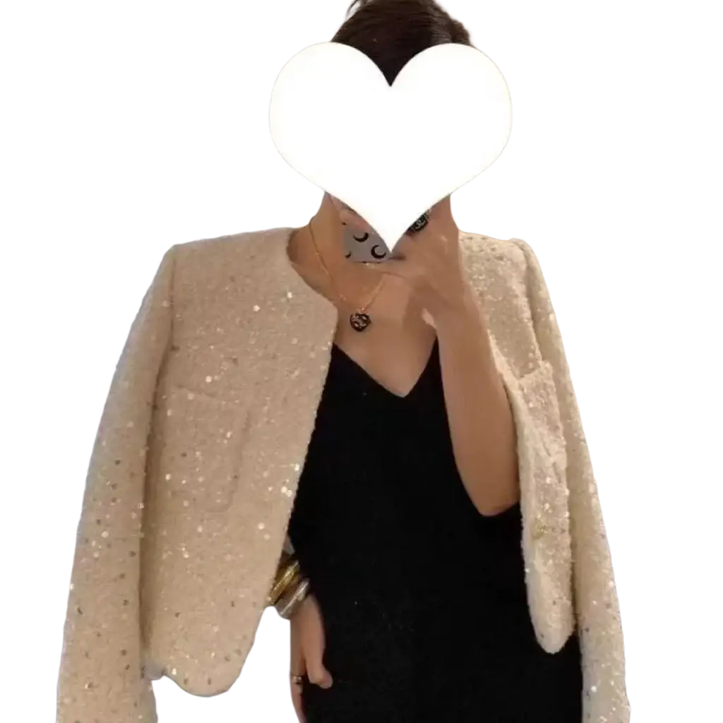 Cream sequined tweed blazer jacket with a structured short design and a subtle sheen in cream color