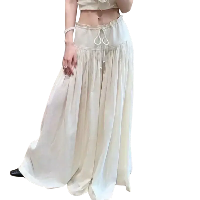 Cream wide leg drawstring pants in a flowing fabric with elasticized hem and adjustable waist for relaxed fit