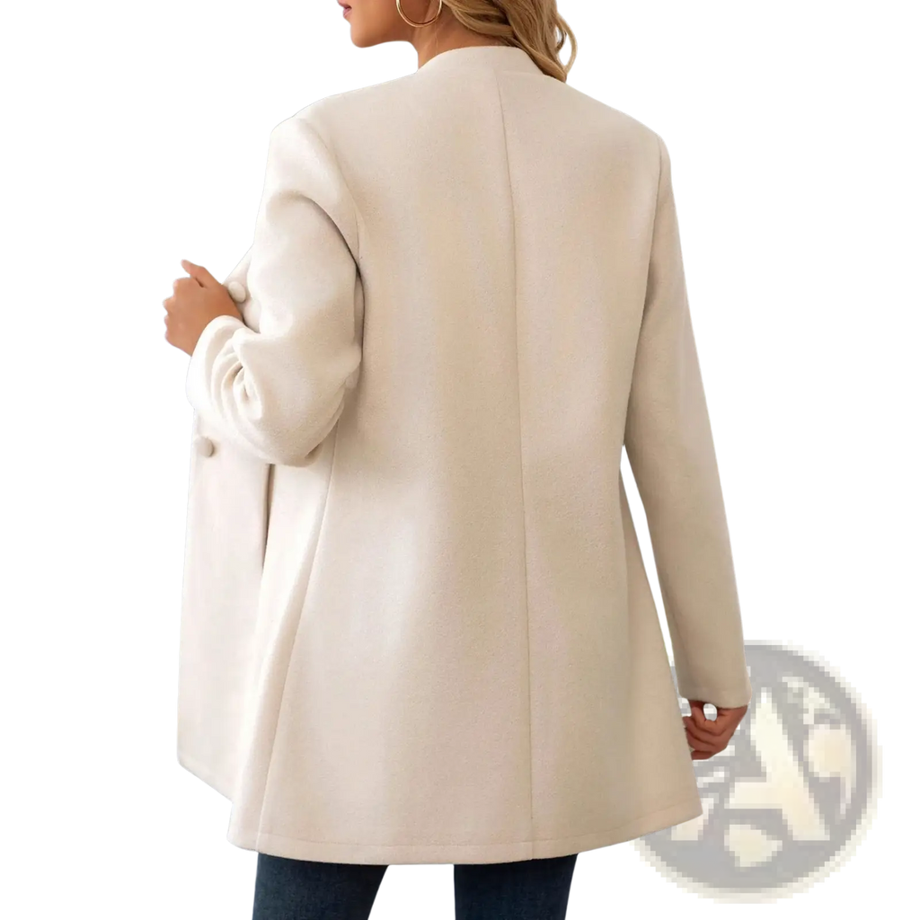 Cream wool blend coat with a stand collar and tailored cream-colored blazer style featuring a sleek structured design