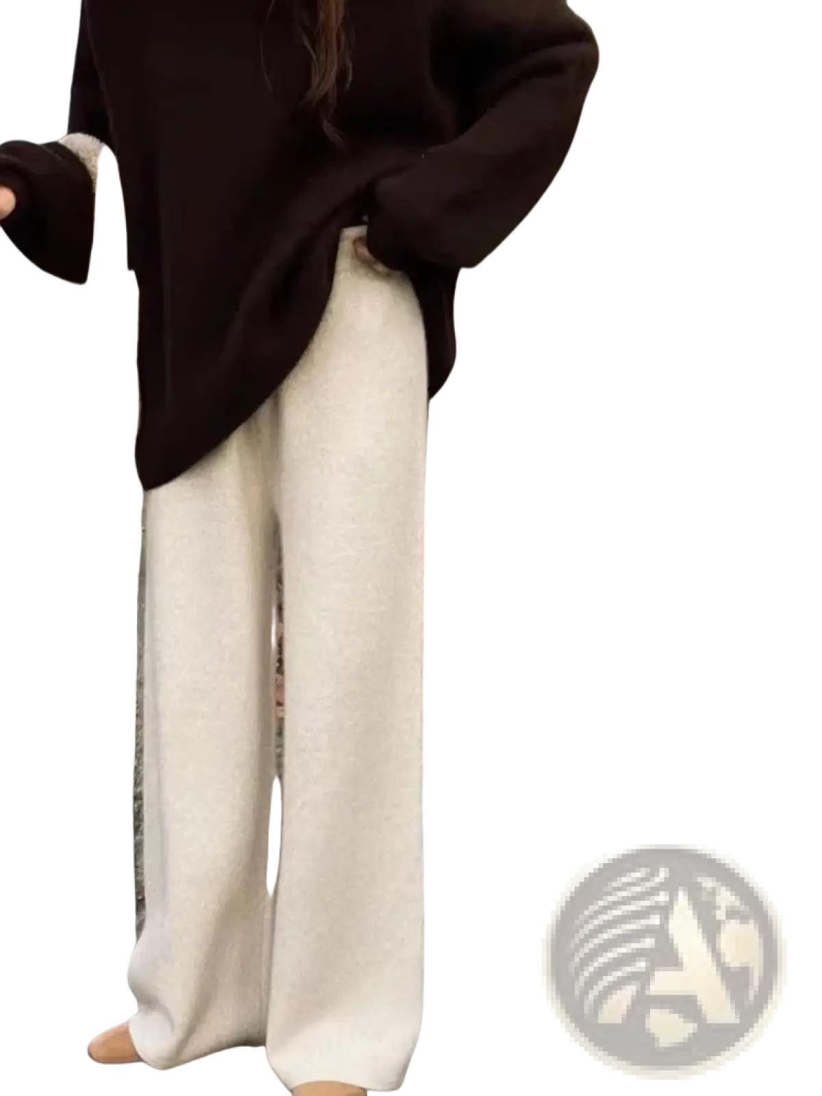 Cream wool wide leg knit pants in cream color featuring soft textured knit and wide leg design