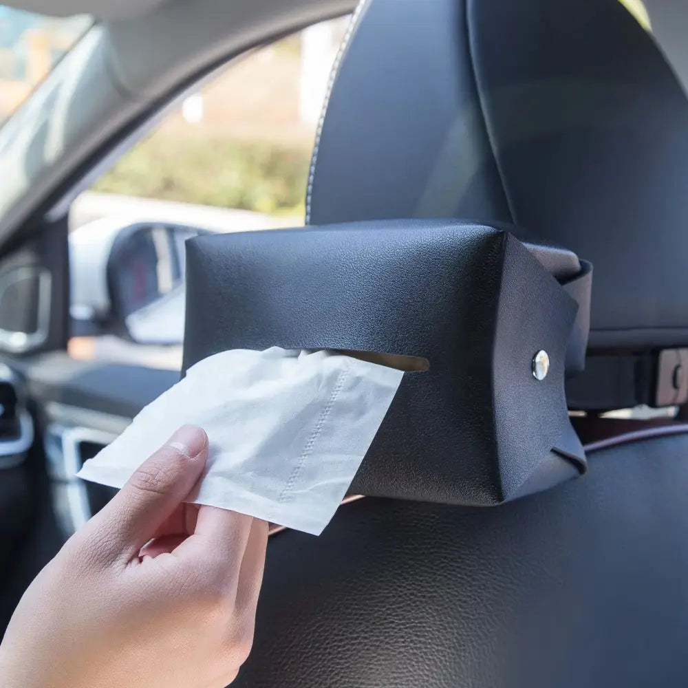 Premium cartoon black leather car headrest tissue box with silver button accent for vehicle organization