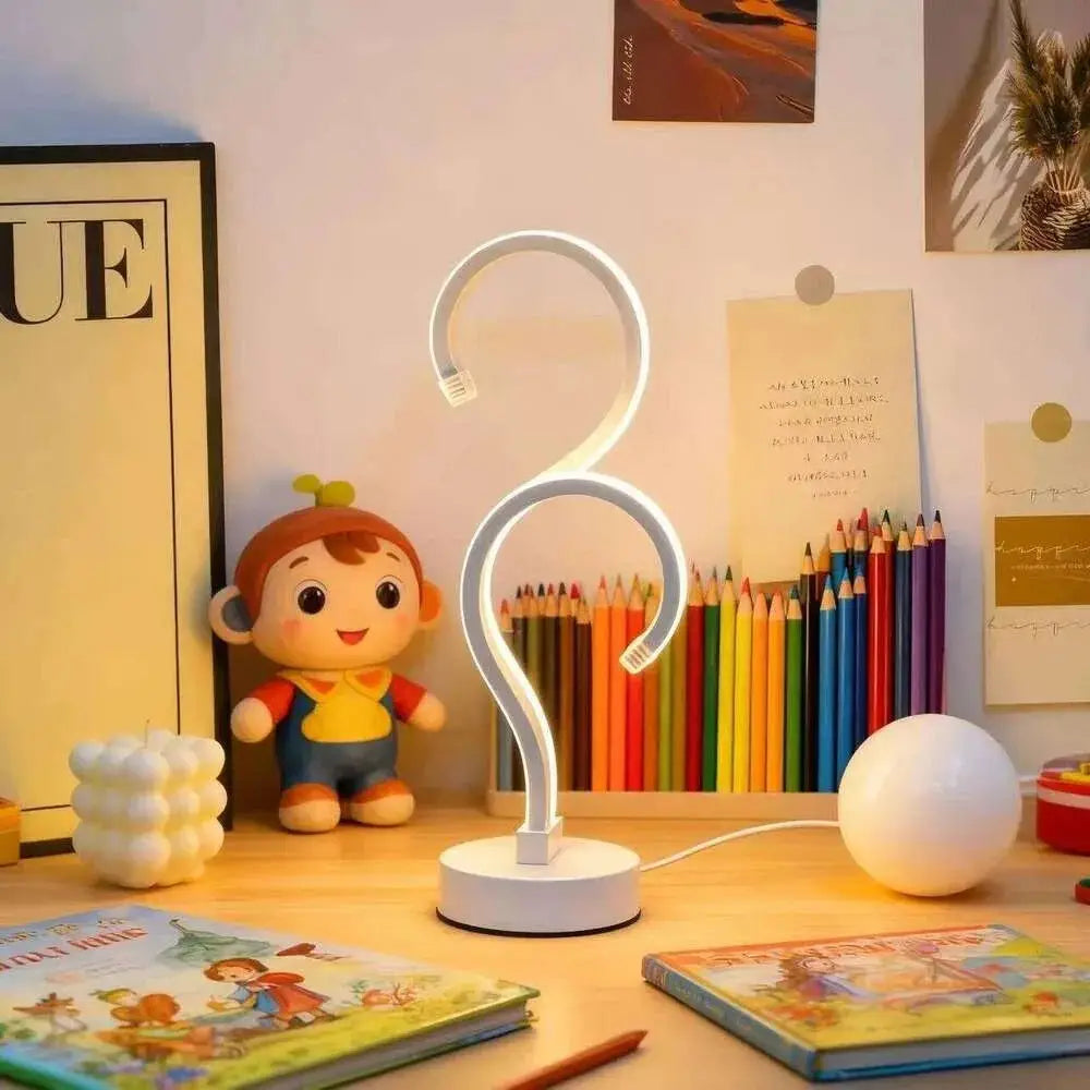 White led desk lamp with sleek curved design and three color modes ideal for modern workspace lighting